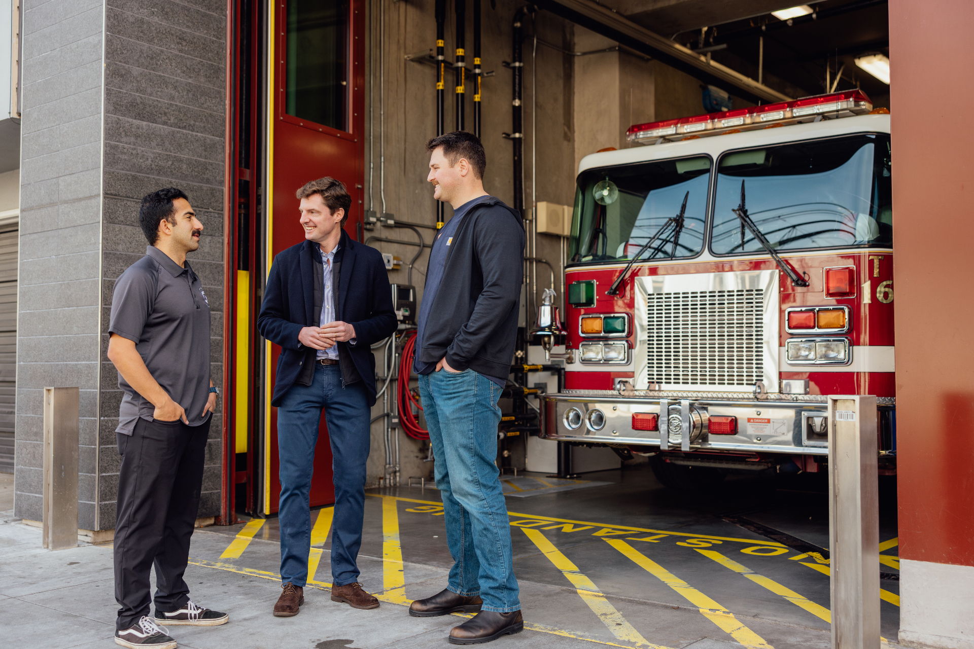 Supervisor Sherrill with firefighters at the fire station